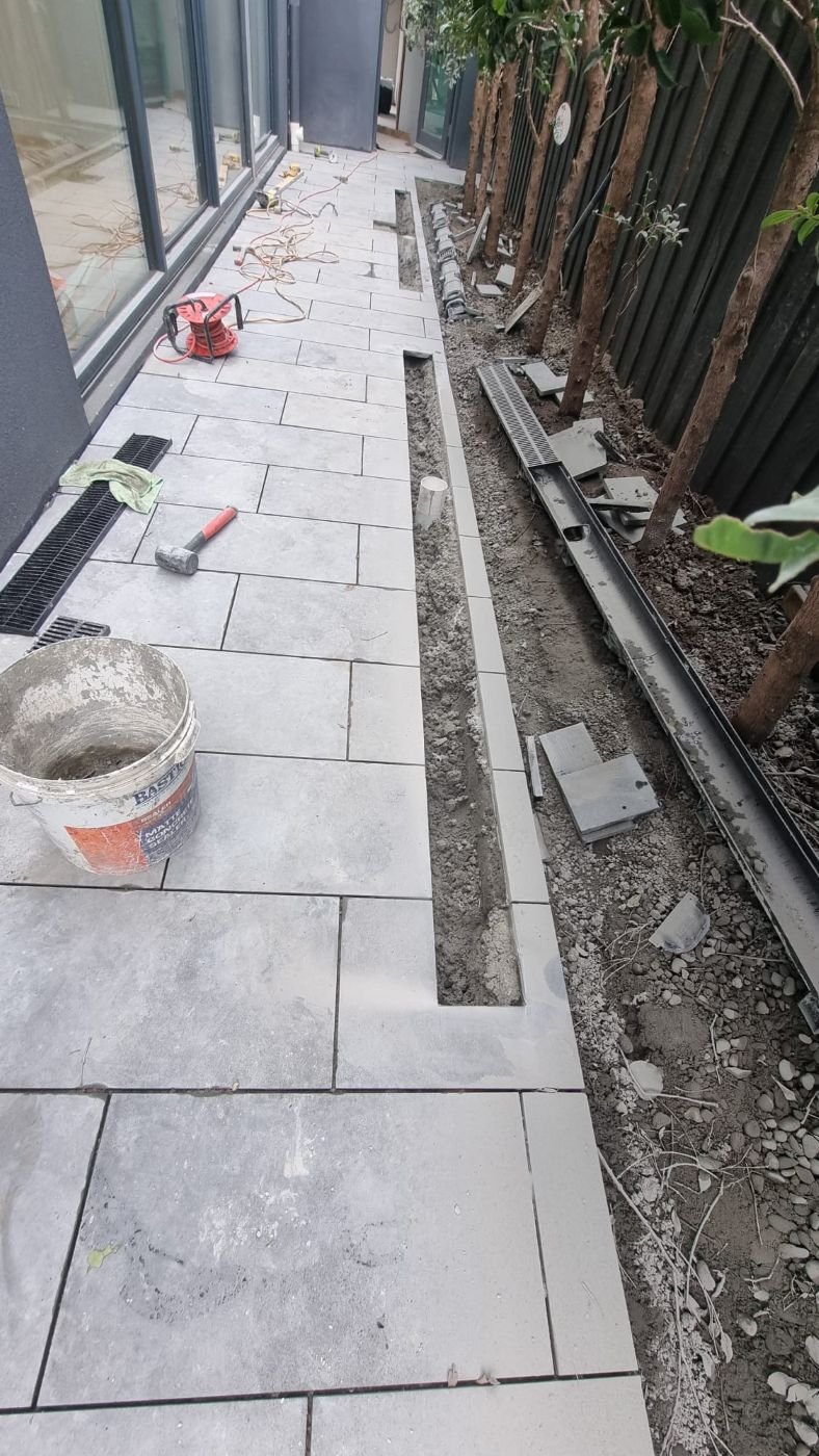 Strip drain and stormwater being installed before paving