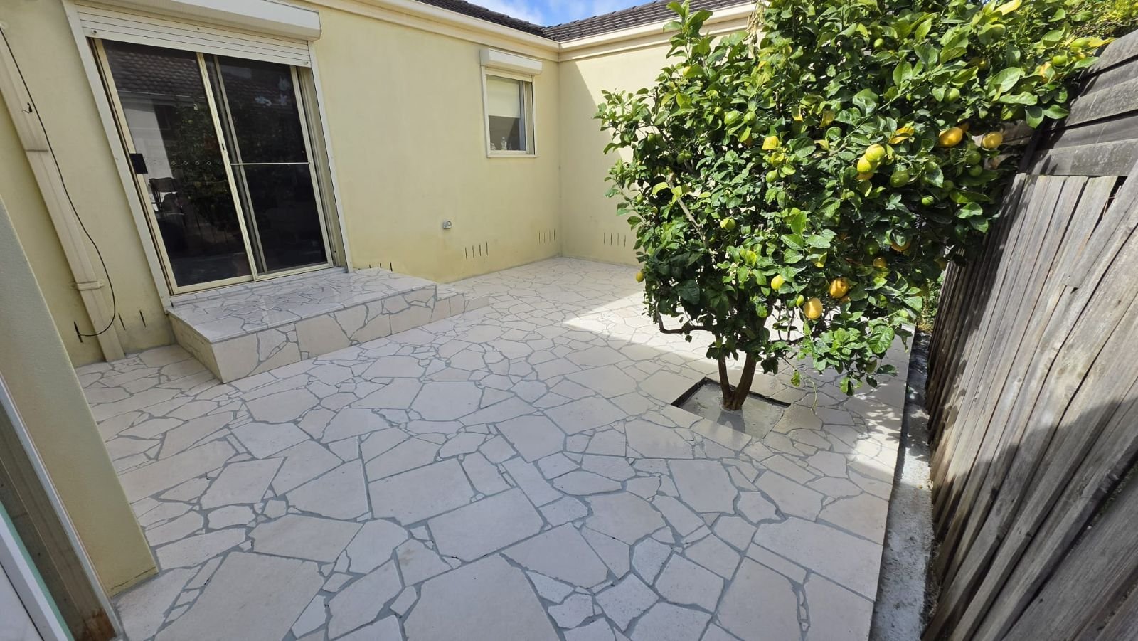 Finished crazy paving courtyard with matching steps in Melbourne