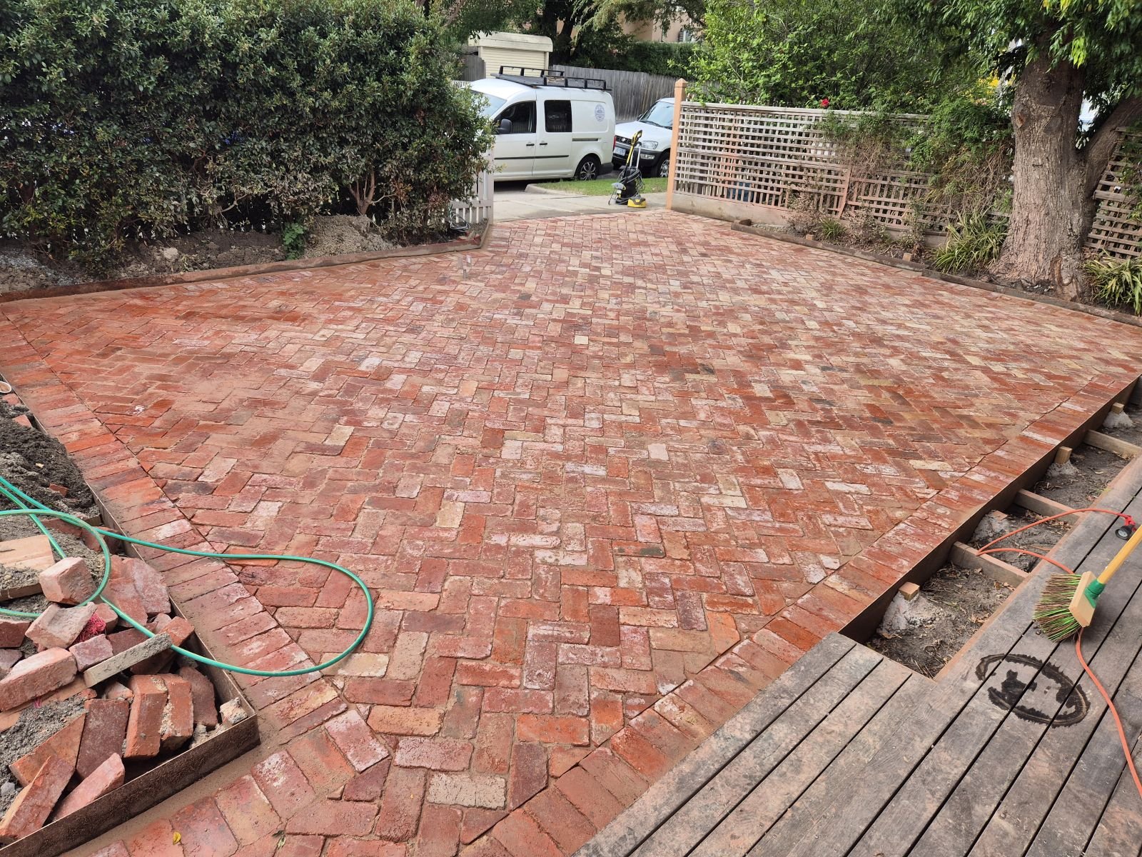 Recycled red brick courtyard laid in herringbone at a Melbourne home