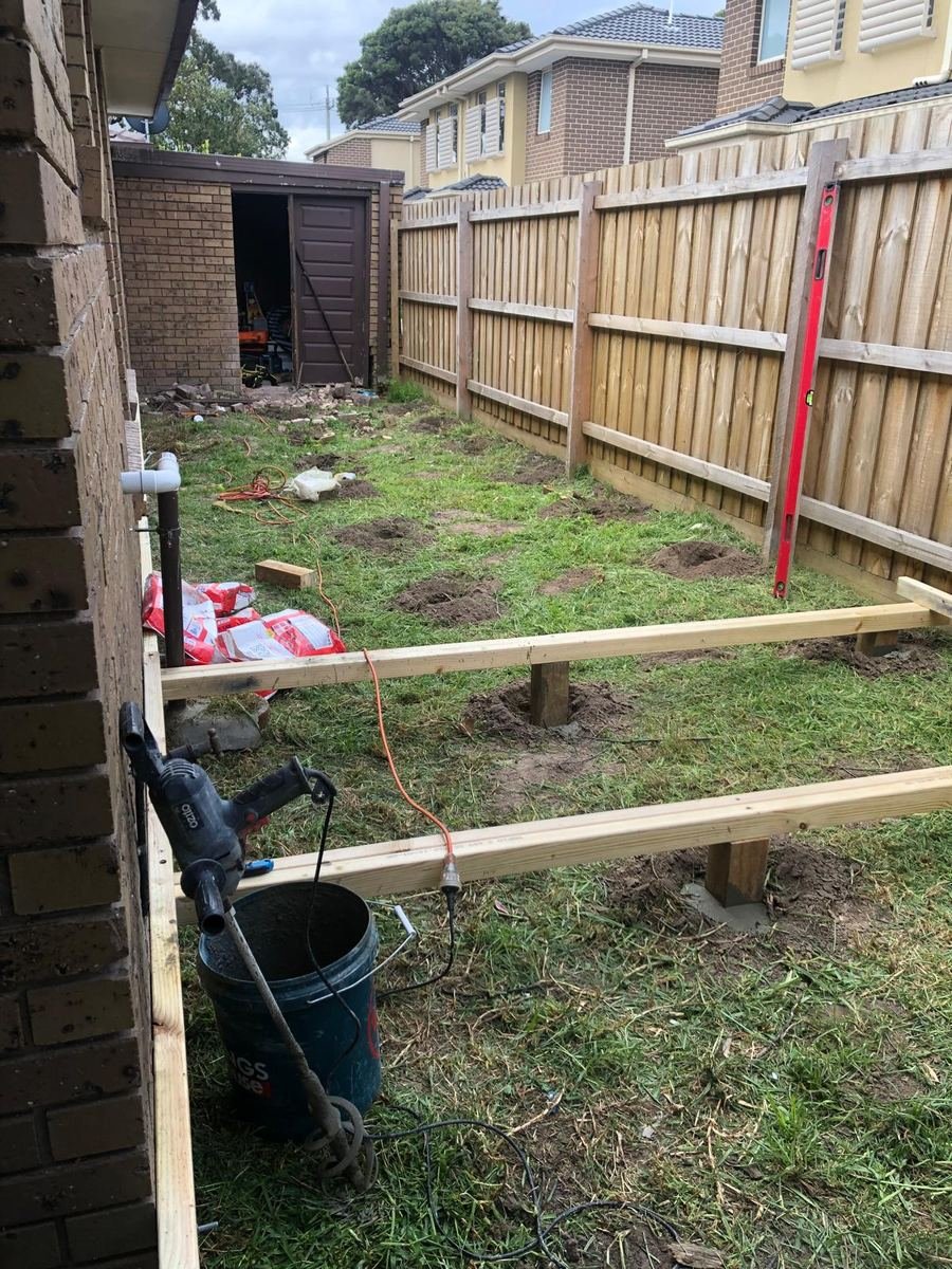 Deck subframe in a side yard