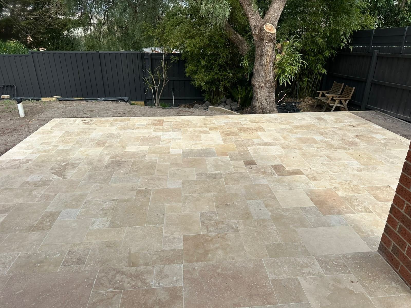 Travertine patio in French pattern